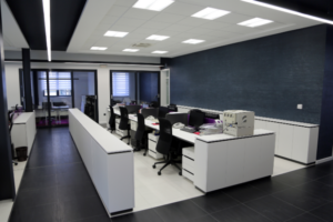 An office with a sleek black and white colour scheme showcasing the superior interior fit-out achieved through a strong subcontractor network.